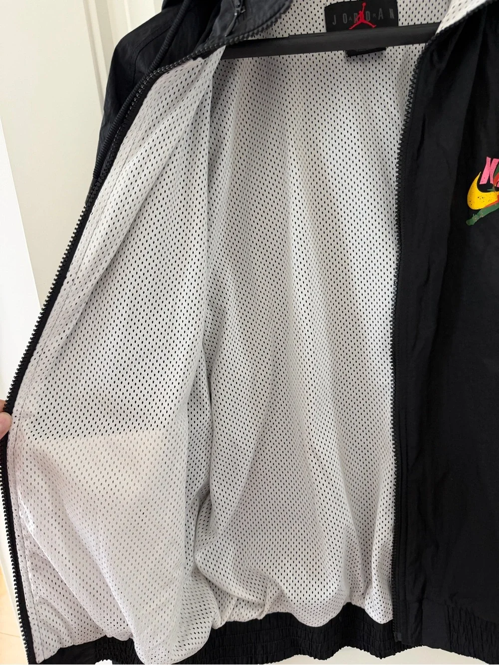 Jordan Black Hooded Windbreaker with Multicolor Logo Accent